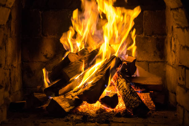 istock Wood burning in a cozy fireplace at home, keep warm 1134720212