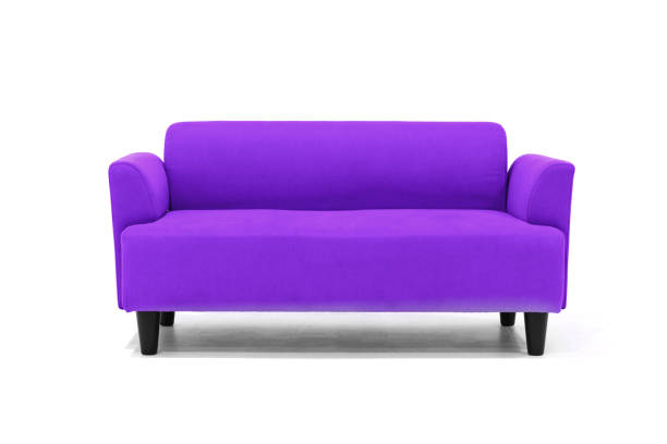 istock Violet Scandinavian style contemporary sofa on white background with modern and minimal furniture design for stylish living room. 1134726476