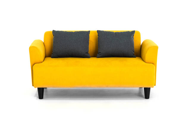 istock Yellow Scandinavian style contemporary sofa on white background with modern and minimal furniture design for stylish living room. 1134726489