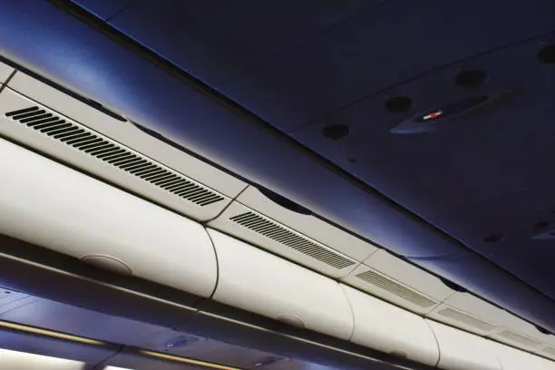 Photo of overhead cabinet for keeping passenger stuff on plane