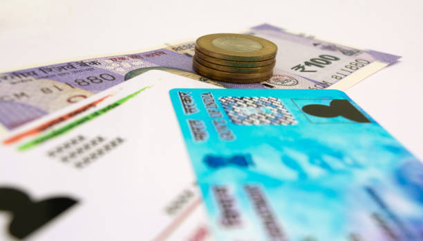 istock Aadhar card and pan card which are issued by Government of India as an identity card with Indian currency. 1134732895