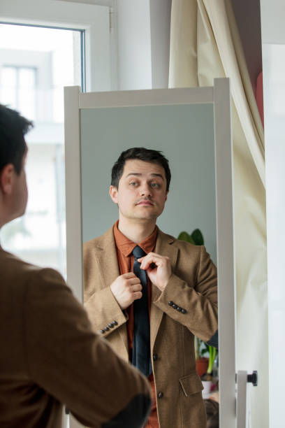 istock Candid view on young man dressing up 1134734910