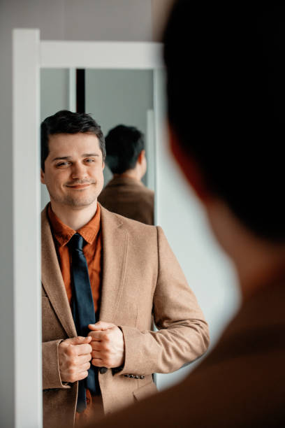 istock Candid view on young man dressing up 1134734919
