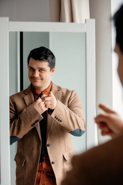 istock Candid view on young man dressing up 1134734920