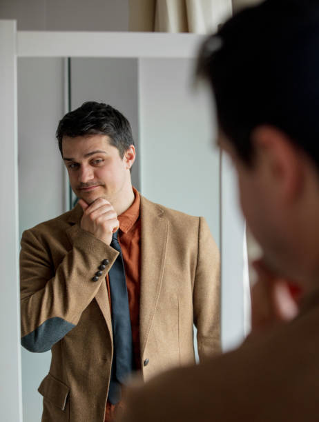 istock Candid view on young man dressing up 1134734928