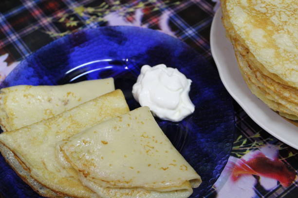 istock pancakes with sour cream on a plate 1134738777