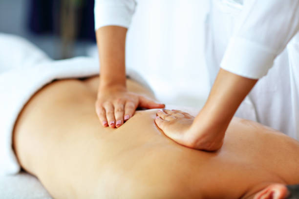 istock Handsome man having massage in spa salon 1134740767