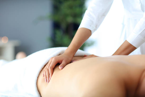 istock Handsome man having massage in spa salon 1134740769