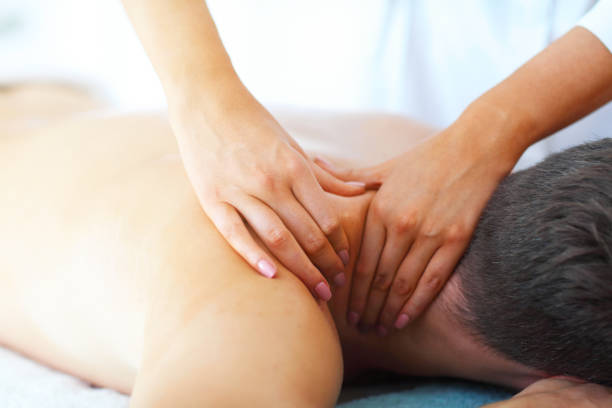 istock Handsome man having massage in spa salon 1134741313