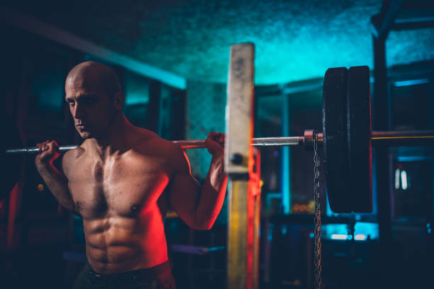 istock Muscular athlete working out at the gym 1134742390