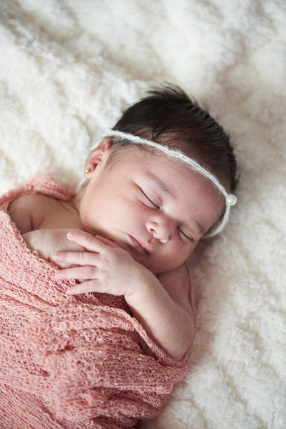 istock One sleeping baby girl 1134742453
