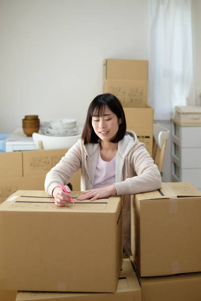istock Woman preparing for moving house 1134748502