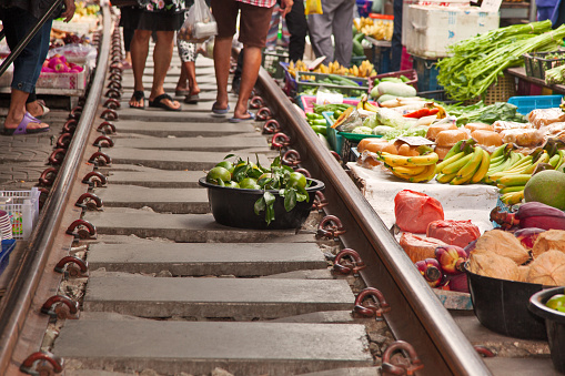 Maeklong Railway Market, a local market commonly called Siang Tai (life-risking) Market. Spreading over a 100-metre length, the market is located by the railway near Mae Klong Railway Station