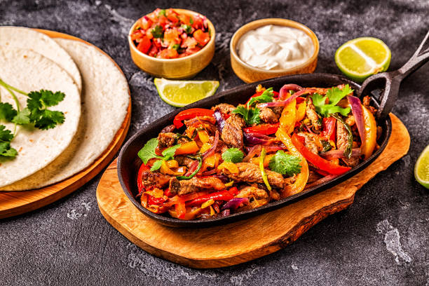 istock FAJITAS with colored pepper and onions 1134749741