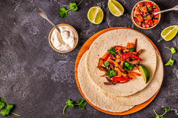 istock FAJITAS with colored pepper and onions 1134749831