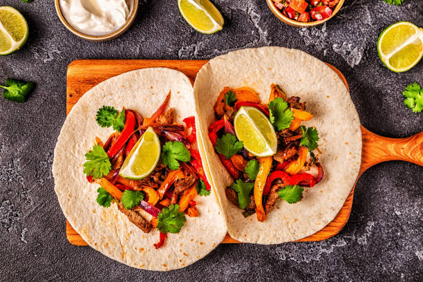 istock FAJITAS with colored pepper and onions 1134749863