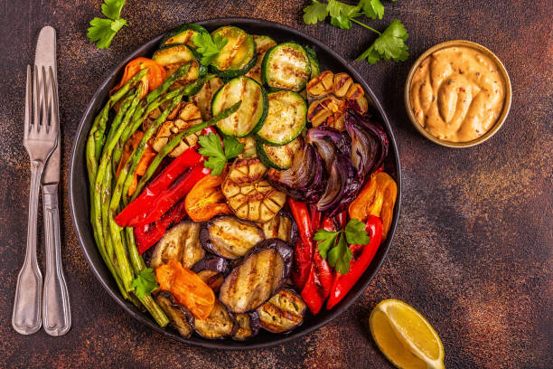 istock Grilled vegetables on a plate with sauce 1134750002