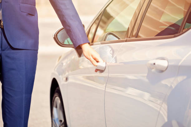 istock Businessman opening a car door 1134752285