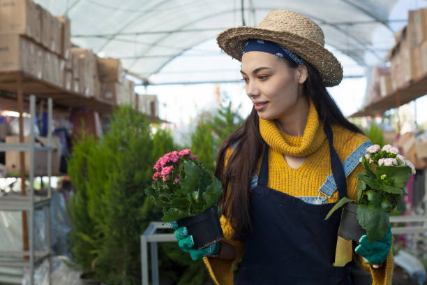 istock woman florist at backyard 1134752451