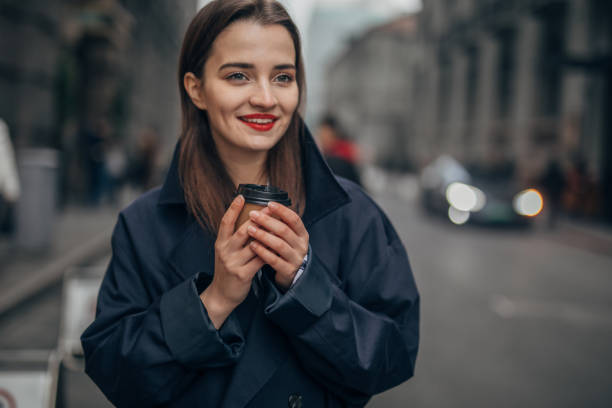 istock Pretty woman loves coffee 1134754329