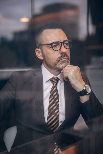 istock Serious senior businessman in suit 1134754652