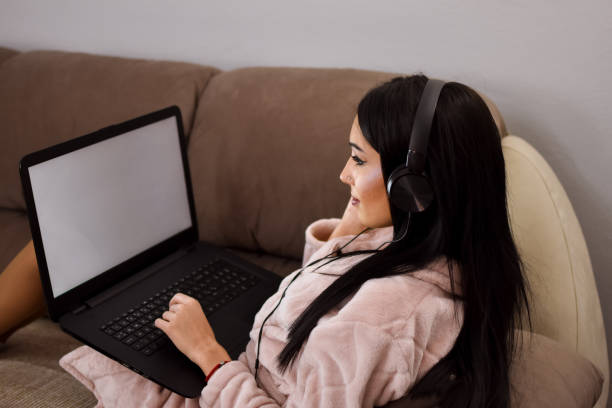 istock Young woman with lap top 1134757658