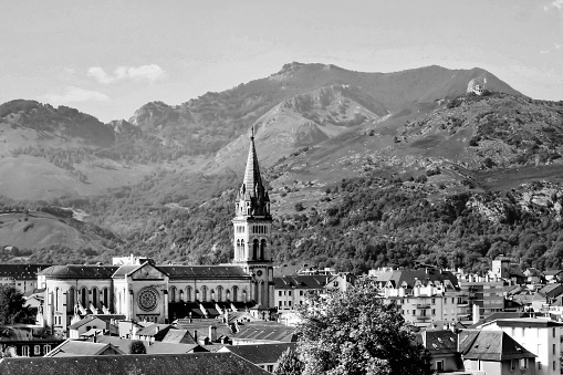 A picture of the Catholic Church in Lourdes in monochrome