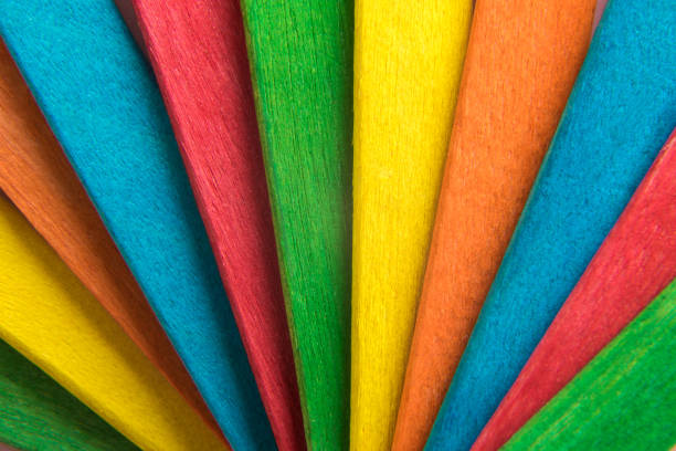 istock Multicolored wooden popsicle sticks background. 1134763971