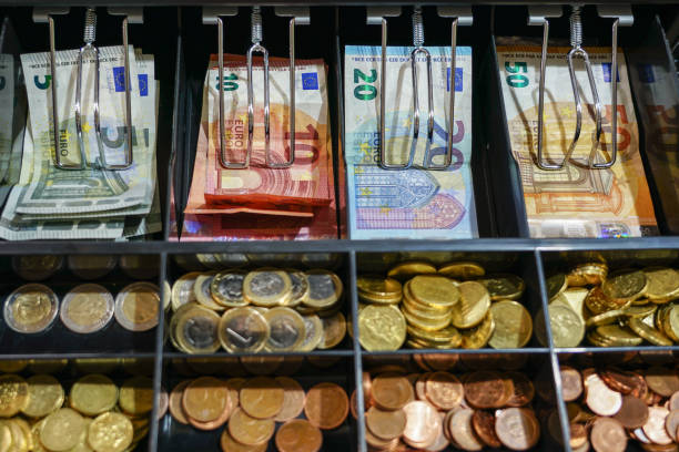 istock Open cash register drawer closeup with money 1134765116