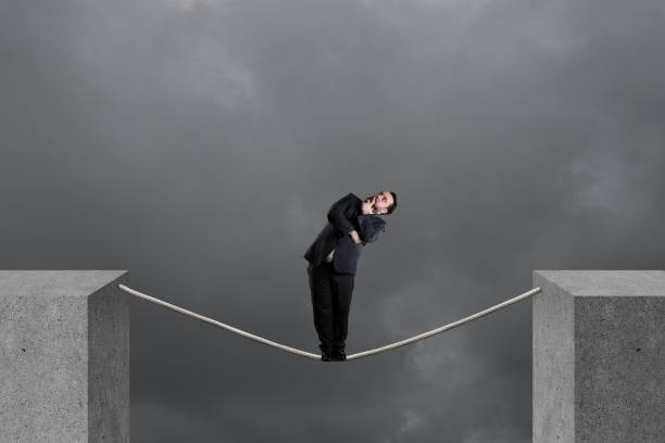 istock Businessman balancing on rope 1134782815