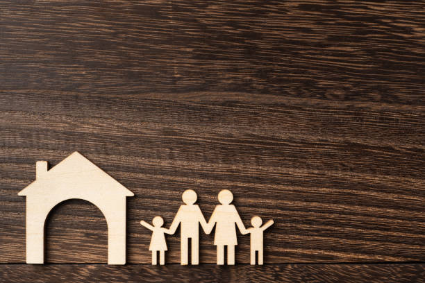 istock wooden family piece with love, secure concept 1134782825