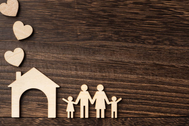 istock wooden family piece with love, secure concept 1134782832