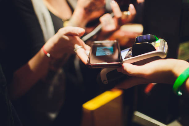 istock Wireless payment for buying a smartphone in the store through the payment terminal. 1134790134