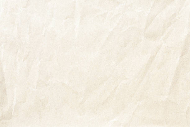 istock Crumpled old brown paper background texture 1134790347