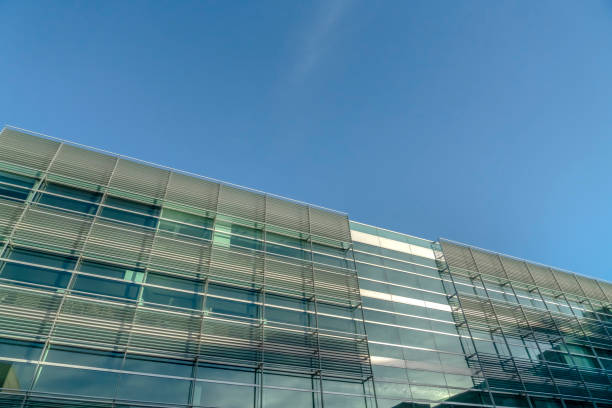 istock Facade of a modern building against blue sky 1134795721