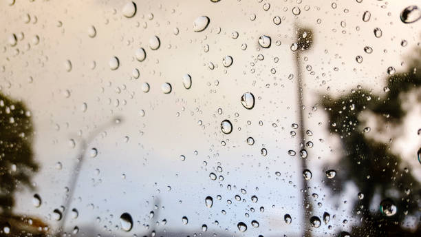 istock Raindrops in car window with background in Macro 1134799519