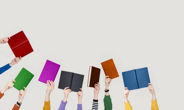 istock The hands of people hold books 1134803757