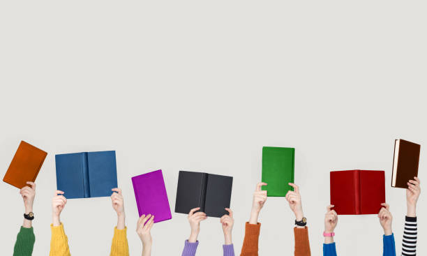 istock The hands of people hold books 1134803760