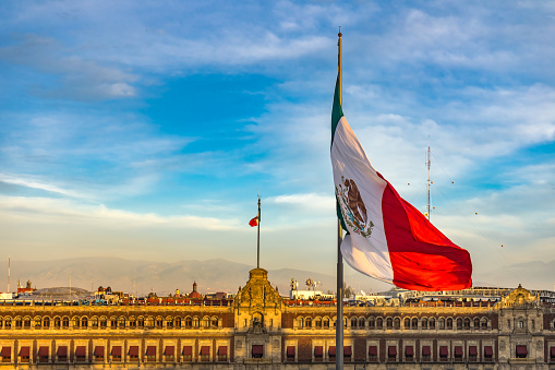 Mexican Flag Presidential National Palace Balcony Monument Zocalo Mexico City Mexico. Palace built by Cortez in 1500s. Balcony where Mexican President Appears.