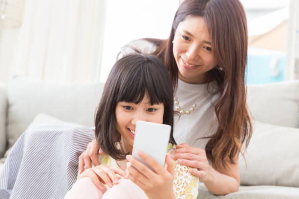 istock asian parent and daughter 1134807137