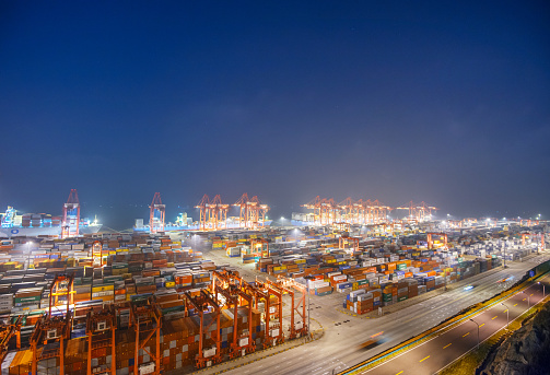 busy port at night in shanghai