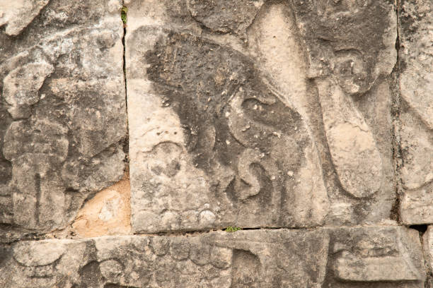 istock Bas-Relief Carving of Skull Breathing Fire, Chichen Itza 1134814955