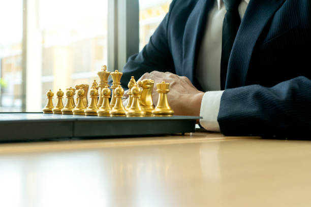 istock Businessman play chess how  to crash 1134817431