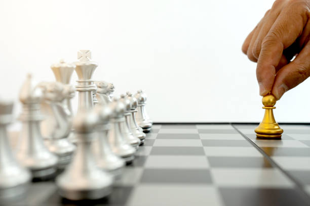 image of hands confident businessman colleagues playing chess game to development analysis new strategy plan, leader and teamwork concept for success. chess gold silver be on game board