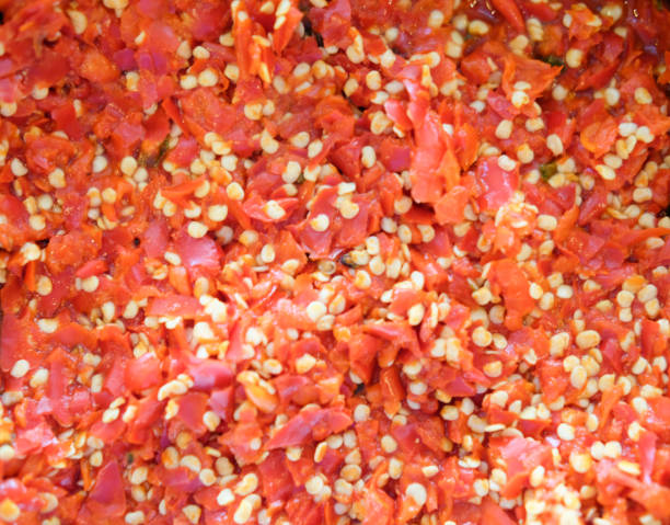 istock Finely red pepper a lot of chopped pepper, texture and surface, close-up 1134818559