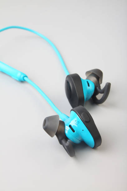 istock New Technology Earphones on gray background 1134820124