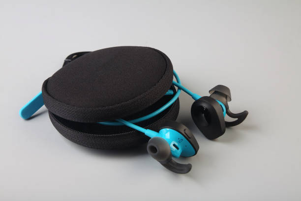 istock Earphones with Carrying Case on gray background 1134820136