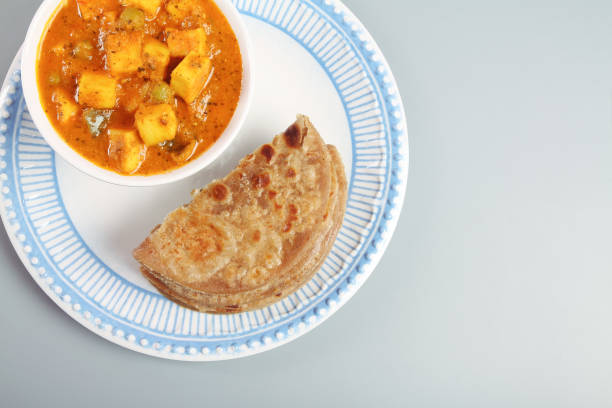 istock Home made Paneer Butter Masala with chapathi 1134821336