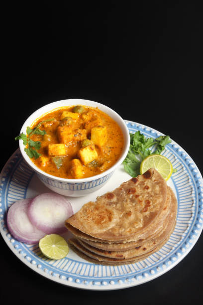 istock Home made Paneer Butter Masala with chapathi 1134821337