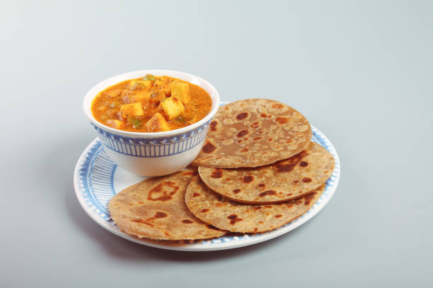 istock Home made Paneer Butter Masala with chapathi 1134821390